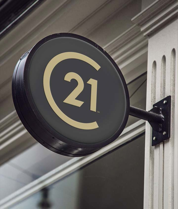 Century 21 房地產中介代理公司新品牌形象設計與logo設計-辦公室圓版標志效果