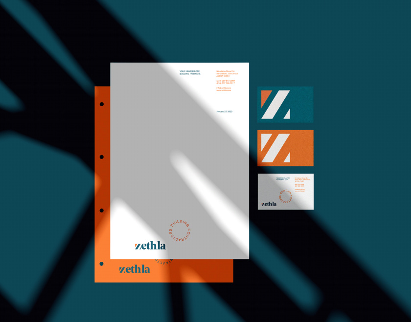 Zethla 建筑公司logo設計vi設計，正方形被斜切出字母Z+藍橙工業配色