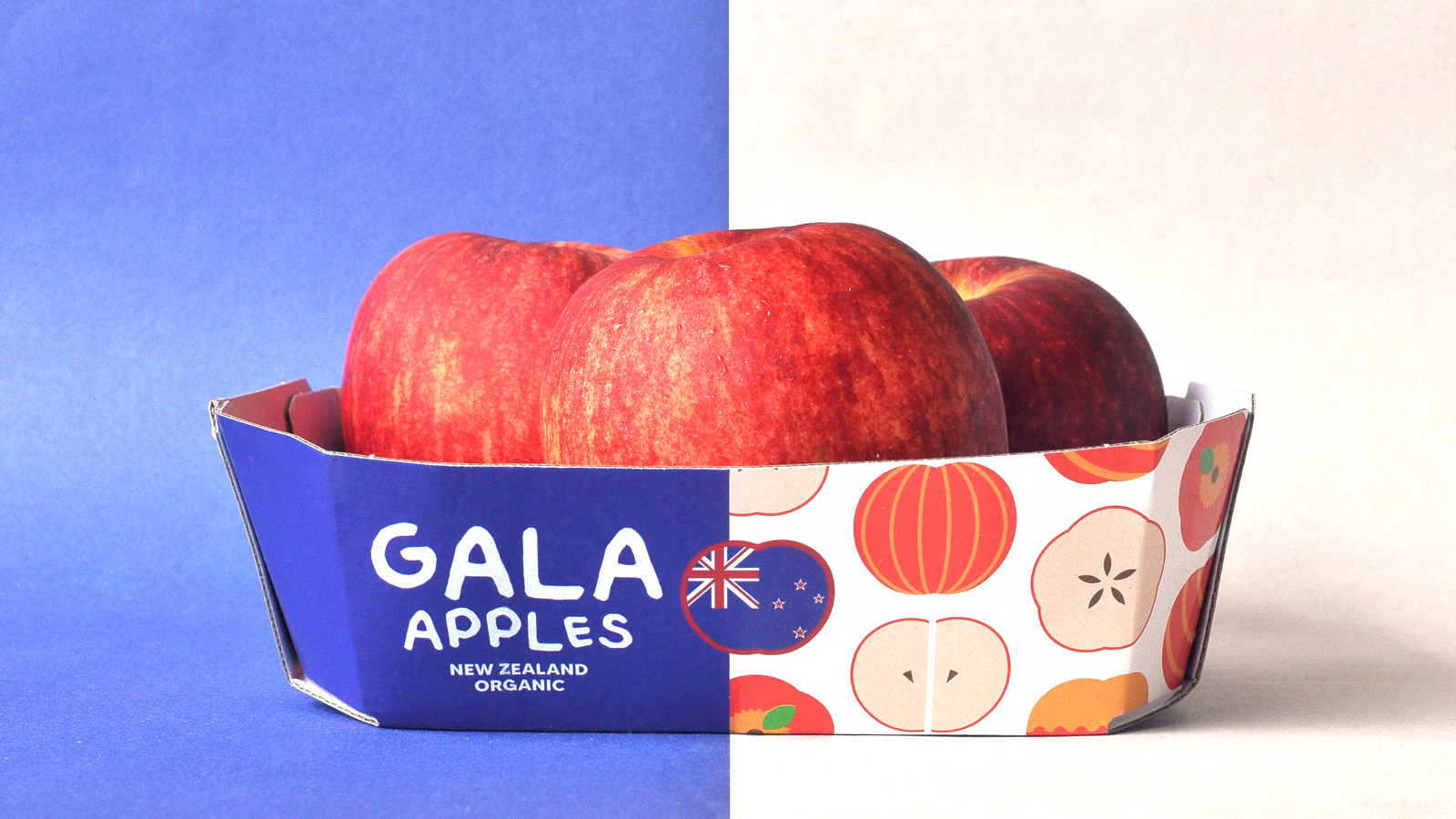GALA 新西蘭有機蘋果節慶敞開式包裝盒設計，新西蘭國旗色+扁平圖標組合